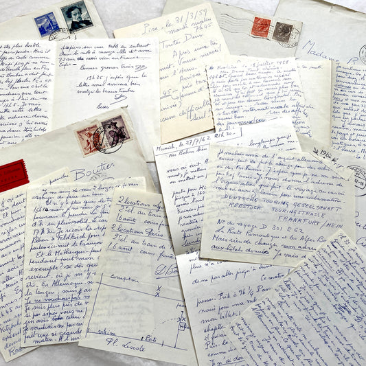 1950s French handwritten letters and envelopes set with vintage stamps from Austria and France. Personal correspondence.