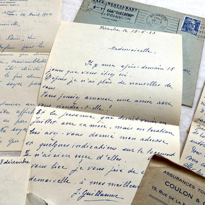 1950s French handwritten letters set with envelopes. Vintage European ephemera showing postmarks and handwriting.