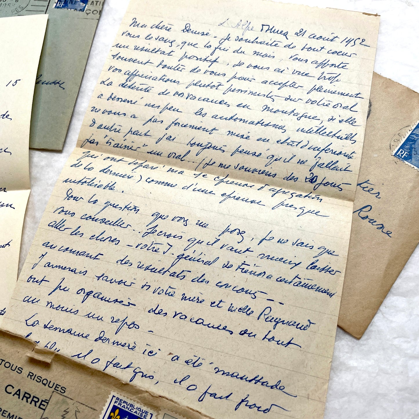 1950s French handwritten letters set with envelopes. Vintage European ephemera showing postmarks and handwriting.