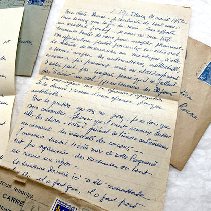 1950s French handwritten letters set with envelopes. Vintage European ephemera showing postmarks and handwriting.