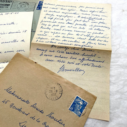 1950s French handwritten letters set with envelopes. Vintage European ephemera showing postmarks and handwriting.