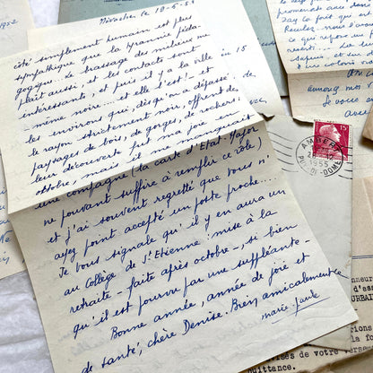 1950s French handwritten letters set with envelopes. Vintage European ephemera showing postmarks and handwriting.