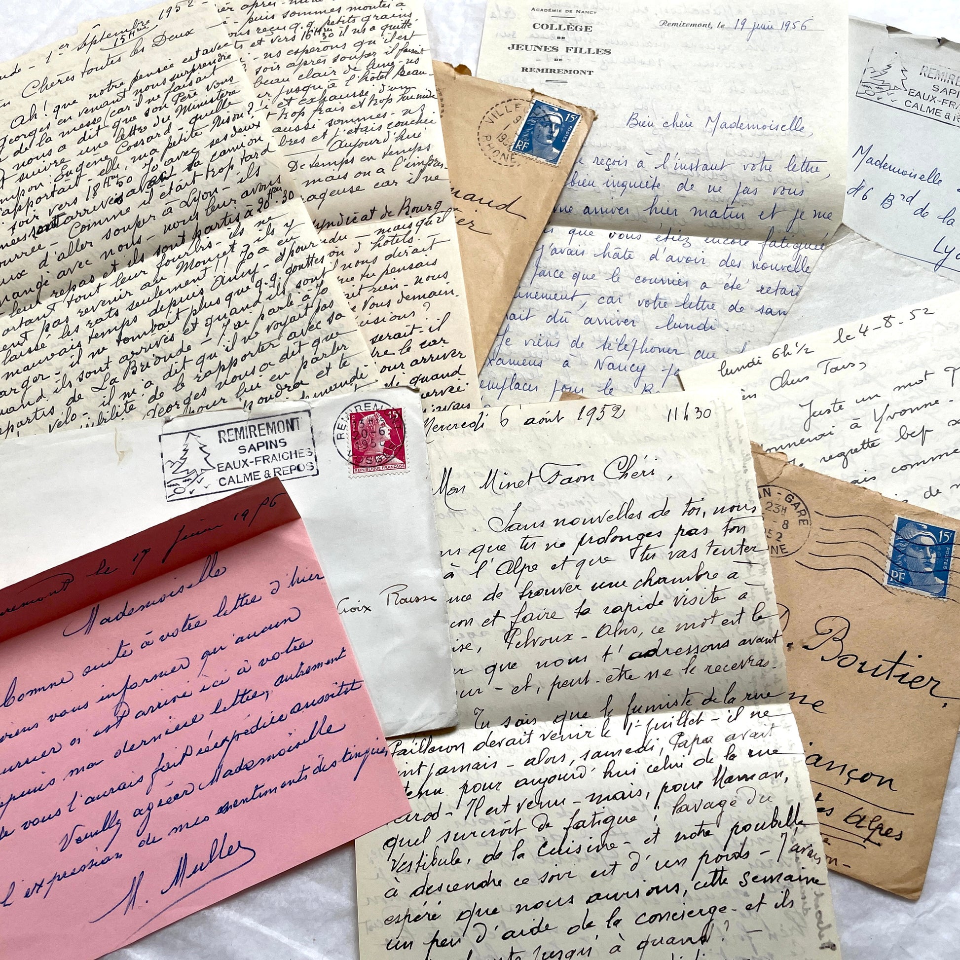 1950s vintage French letters and envelopes set, featuring beautiful handwritten script, postage stamps, and postmarks.