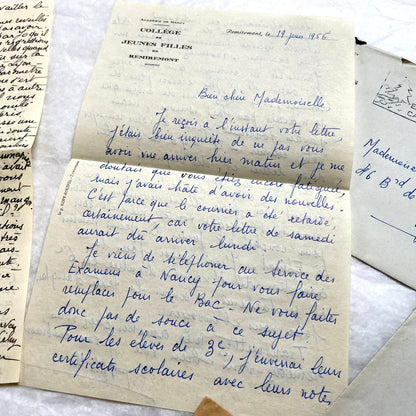 1950s vintage French letters and envelopes set, featuring beautiful handwritten script, postage stamps, and postmarks.