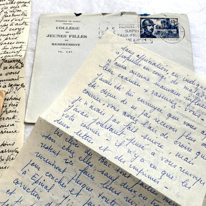 1950s vintage French letters and envelopes set, featuring beautiful handwritten script, postage stamps, and postmarks.