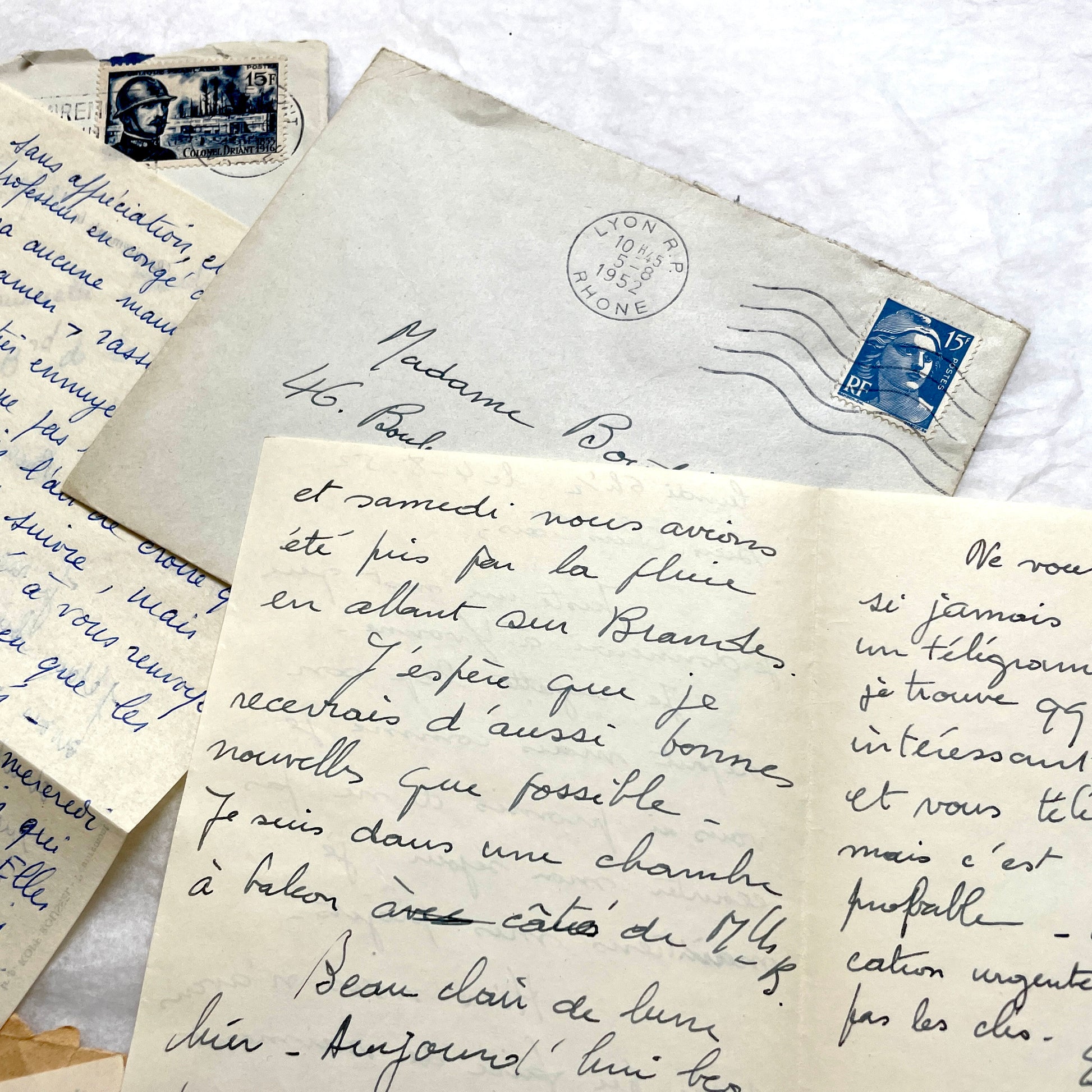 1950s vintage French letters and envelopes set, featuring beautiful handwritten script, postage stamps, and postmarks.