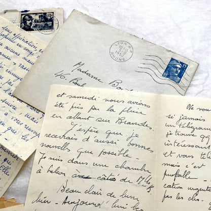 1950s vintage French letters and envelopes set, featuring beautiful handwritten script, postage stamps, and postmarks.
