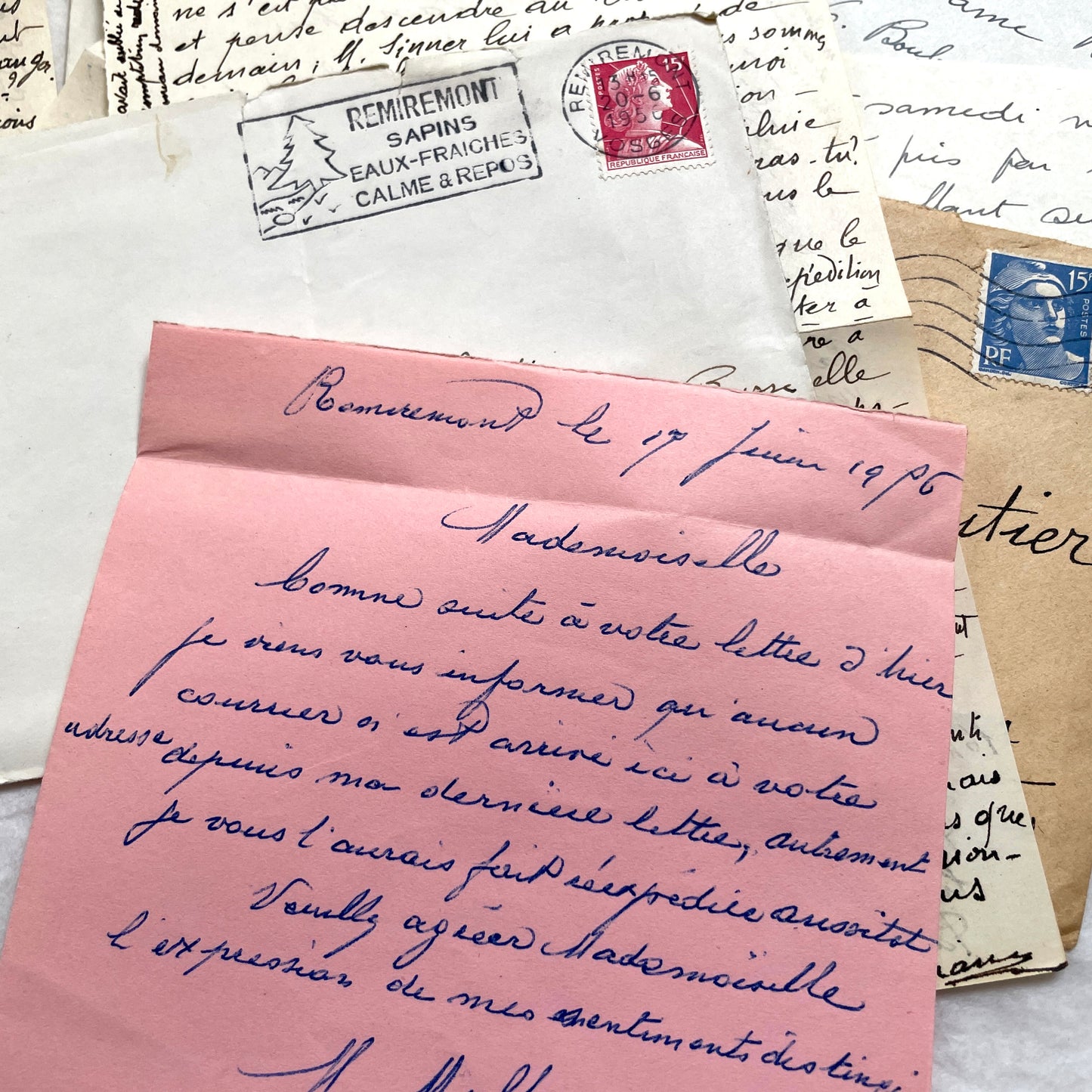 1950s vintage French letters and envelopes set, featuring beautiful handwritten script, postage stamps, and postmarks.