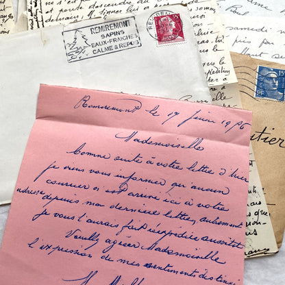 1950s vintage French letters and envelopes set, featuring beautiful handwritten script, postage stamps, and postmarks.