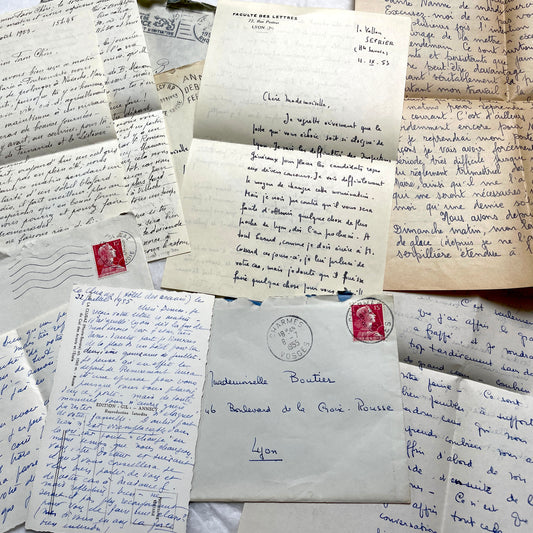 Set of 1950s French handwritten letters with original envelopes and vintage stamps, showing personal correspondence.