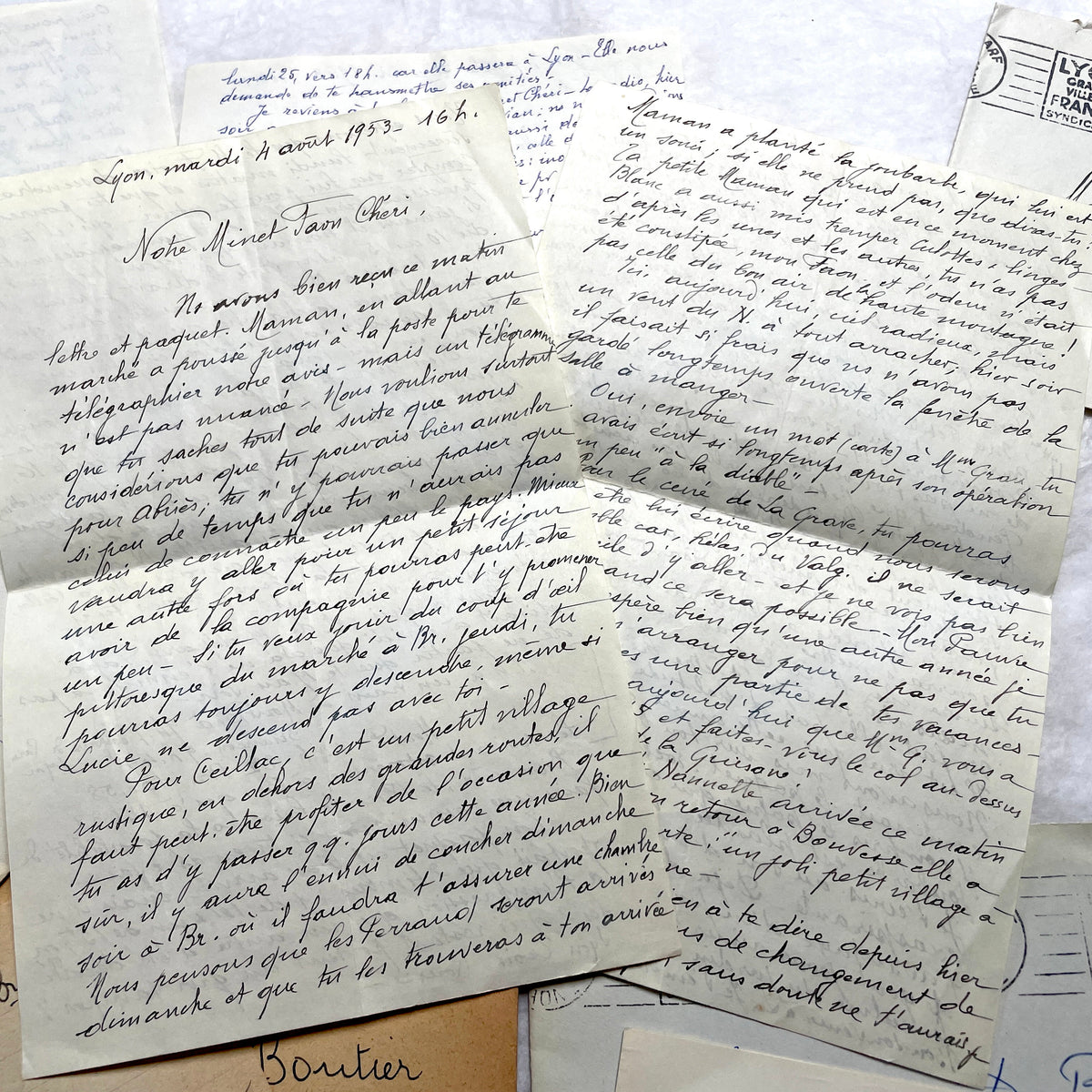 1950s French handwritten letters set with envelopes, vintage stamps, and postmarks. Historical correspondence.