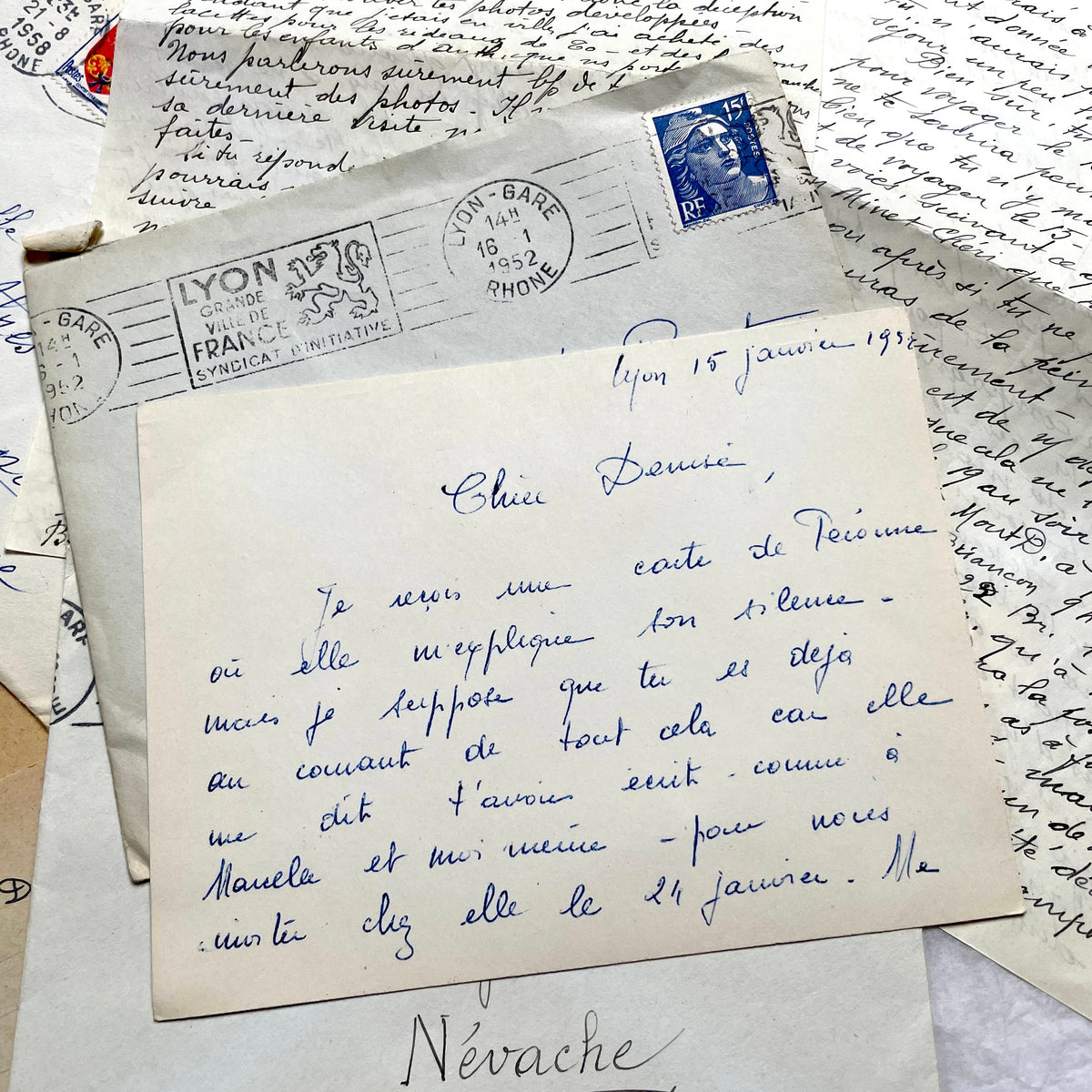 1950s French handwritten letters set with envelopes, vintage stamps, and postmarks. Historical correspondence.