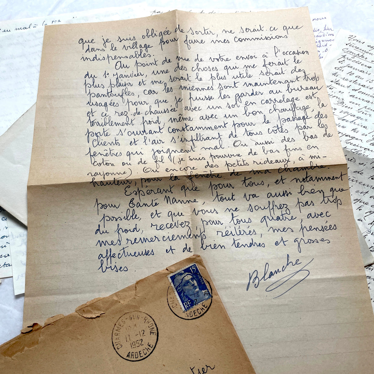1950s French handwritten letters set with envelopes, vintage stamps, and postmarks. Historical correspondence.