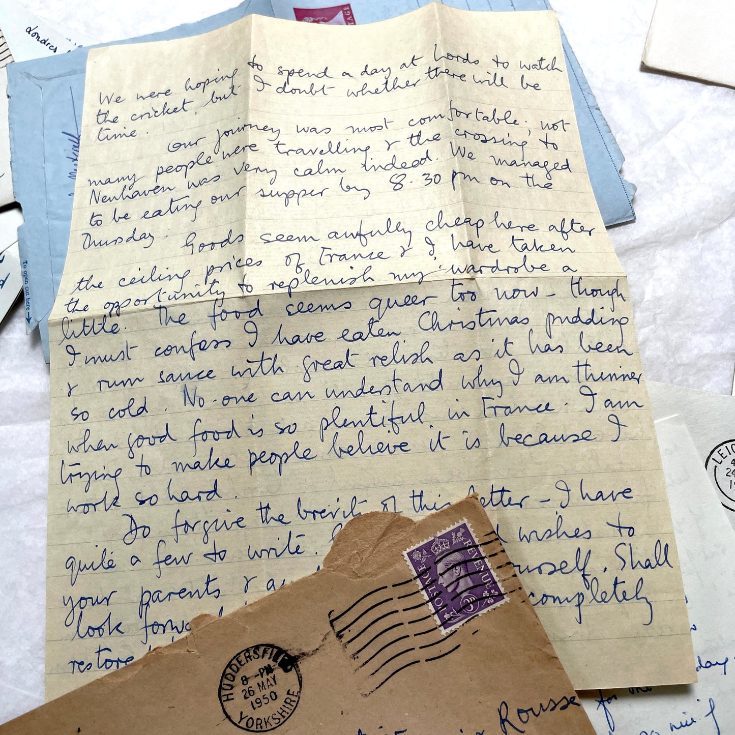 Set of 1960s handwritten letters and envelopes with vintage stamps and postmarks, displaying English and French text.