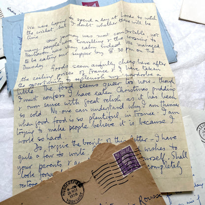 Set of 1960s handwritten letters and envelopes with vintage stamps and postmarks, displaying English and French text.