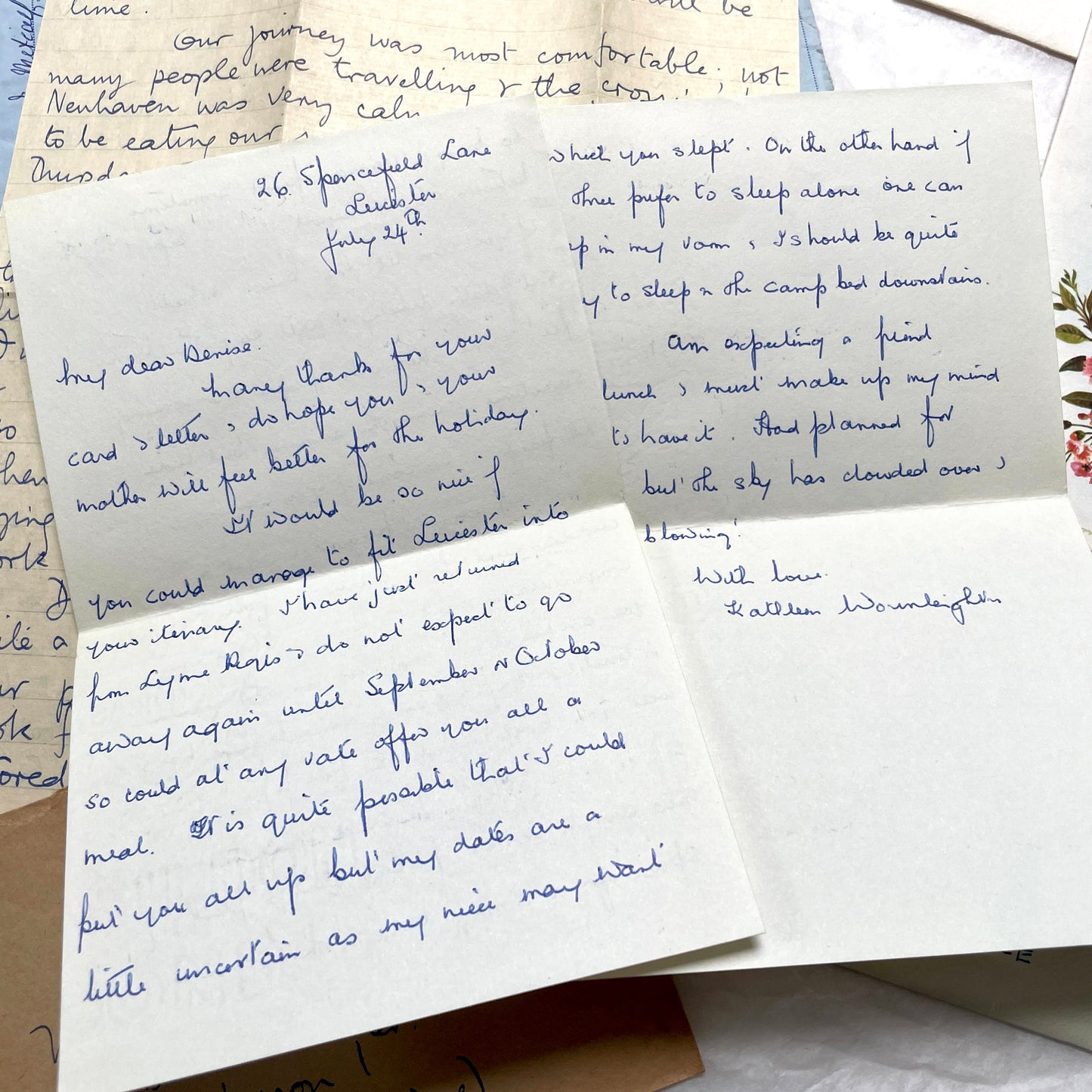Set of 1960s handwritten letters and envelopes with vintage stamps and postmarks, displaying English and French text.