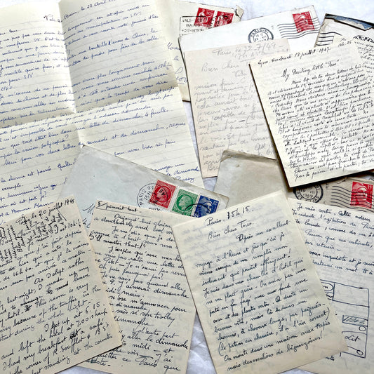 1940s French letter set with 5 handwritten letters and original envelopes, featuring vintage stamps and postmarks.