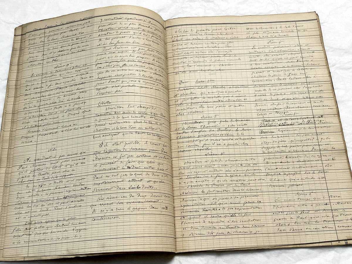 Late 19th French play script manuscript showing neat handwritten text in a vintage ledger book.