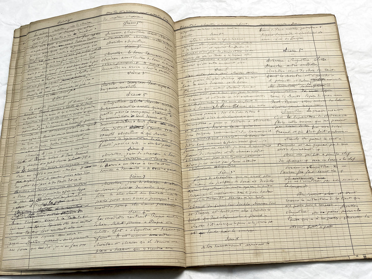 Late 19th French play script manuscript showing neat handwritten text in a vintage ledger book.
