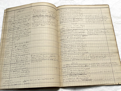 Late 19th French play script manuscript showing neat handwritten text in a vintage ledger book.