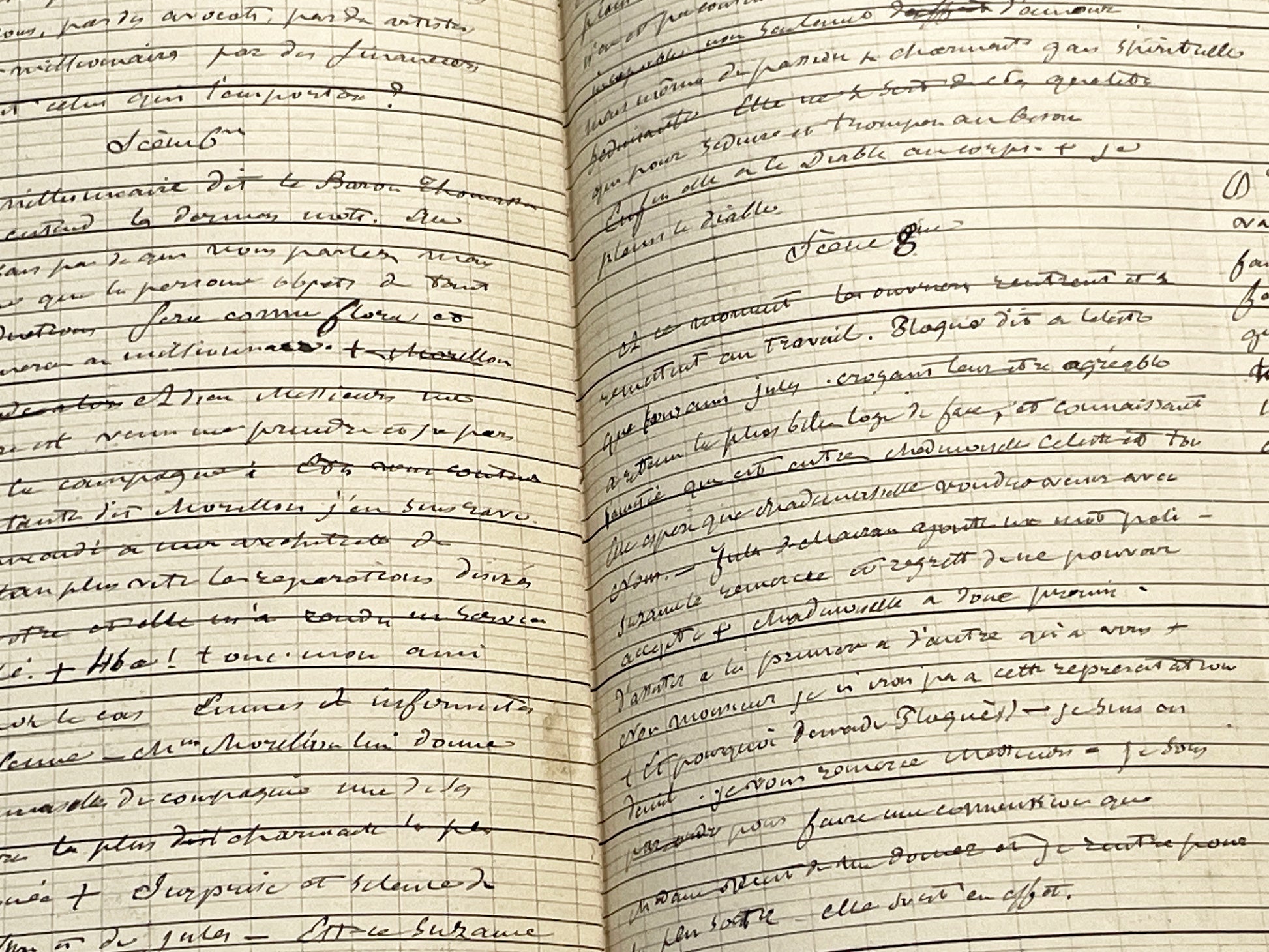 Late 19th French play script manuscript showing neat handwritten text in a vintage ledger book.