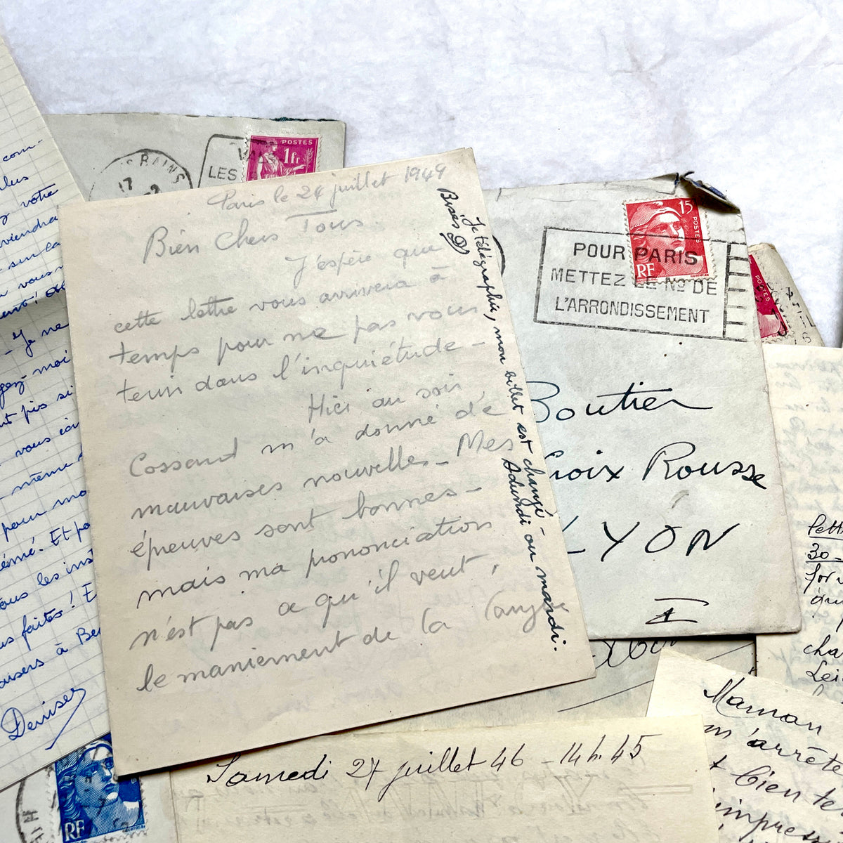 1940s French handwritten letters and envelopes with vintage stamps and postmarks, authentic paper ephemera.