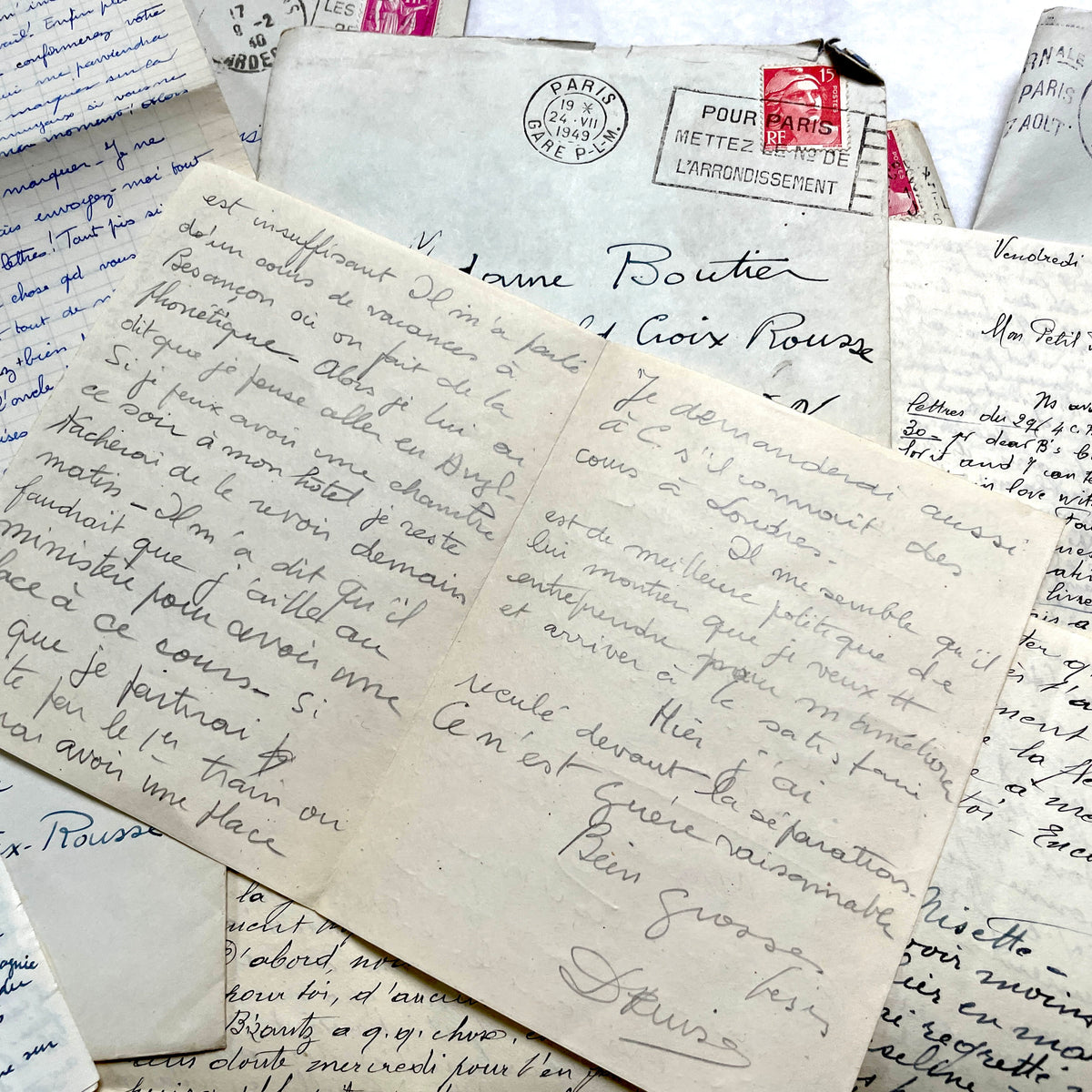 1940s French handwritten letters and envelopes with vintage stamps and postmarks, authentic paper ephemera.