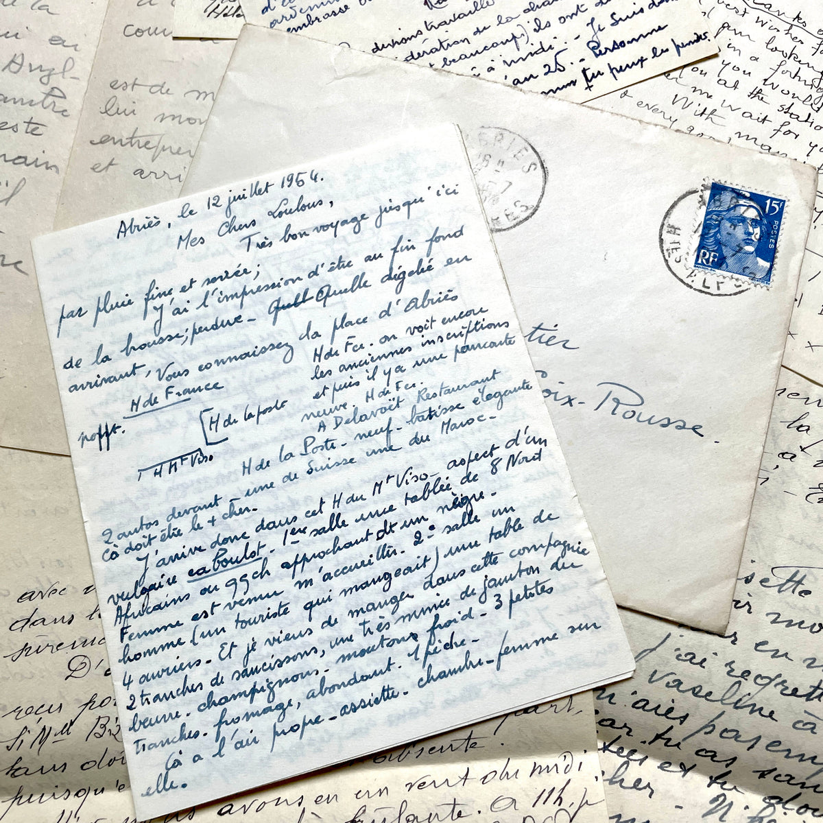 1940s French handwritten letters and envelopes with vintage stamps and postmarks, authentic paper ephemera.