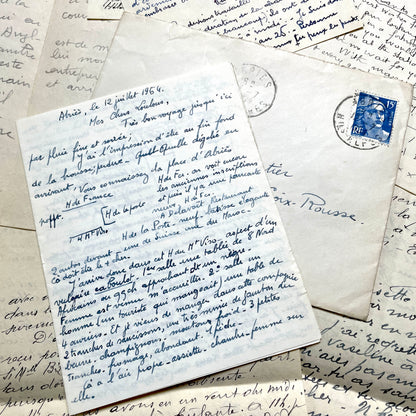 1940s French handwritten letters and envelopes with vintage stamps and postmarks, authentic paper ephemera.