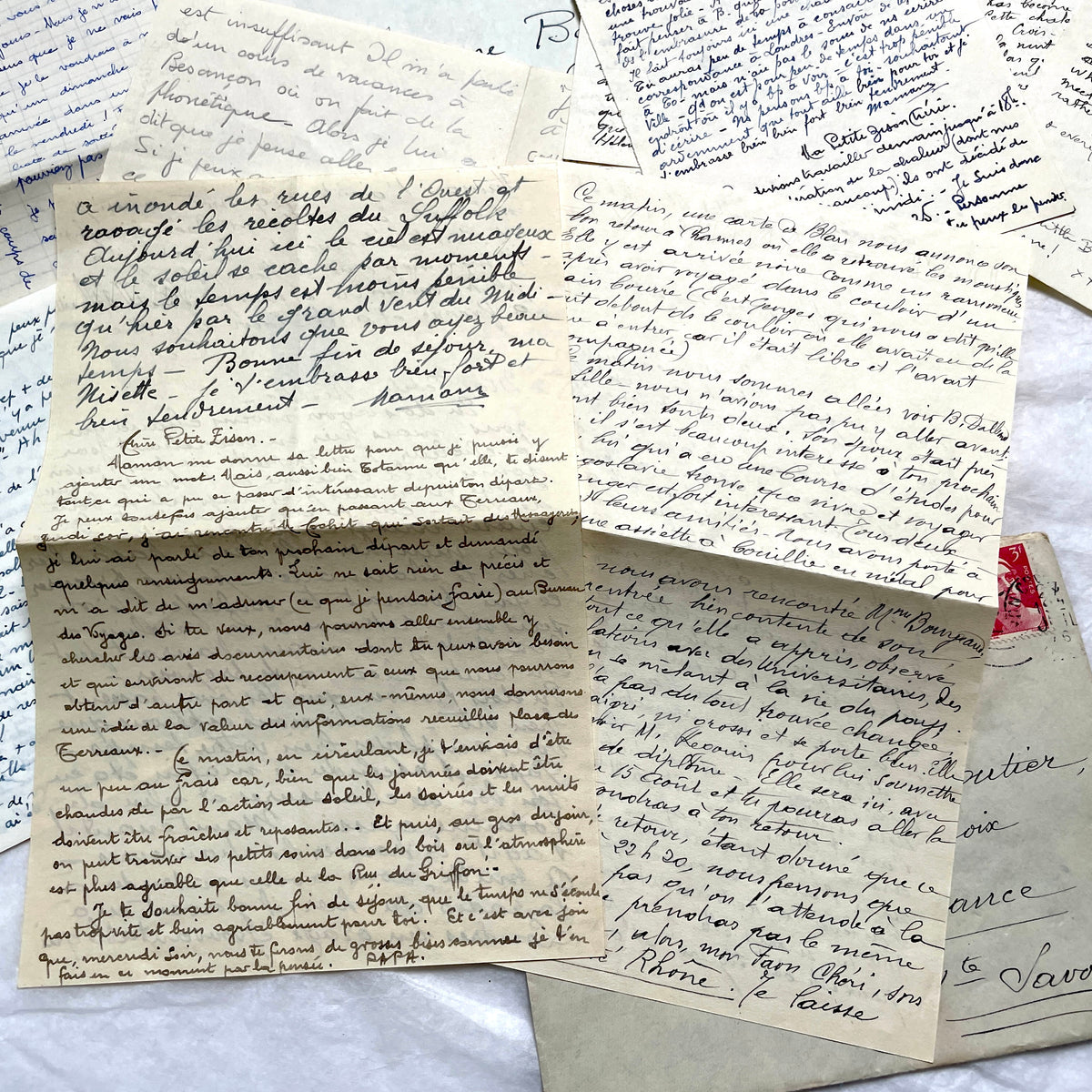 1940s French handwritten letters and envelopes with vintage stamps and postmarks, authentic paper ephemera.
