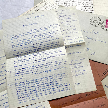 Set of 1940s vintage French letters with envelopes, featuring handwritten text, original stamps, and postmarks.