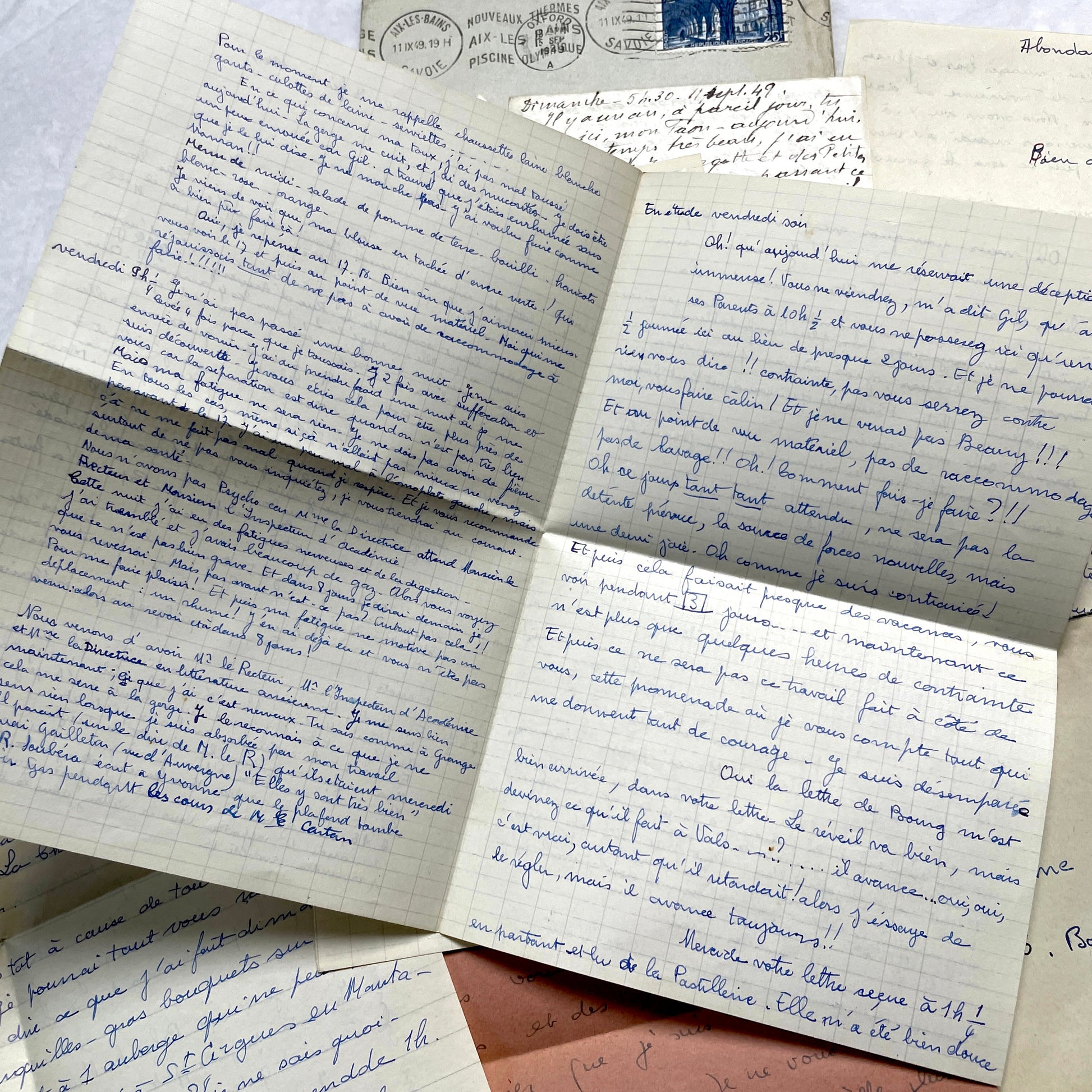 Set of 1940s vintage French letters with envelopes, featuring handwritten text, original stamps, and postmarks.