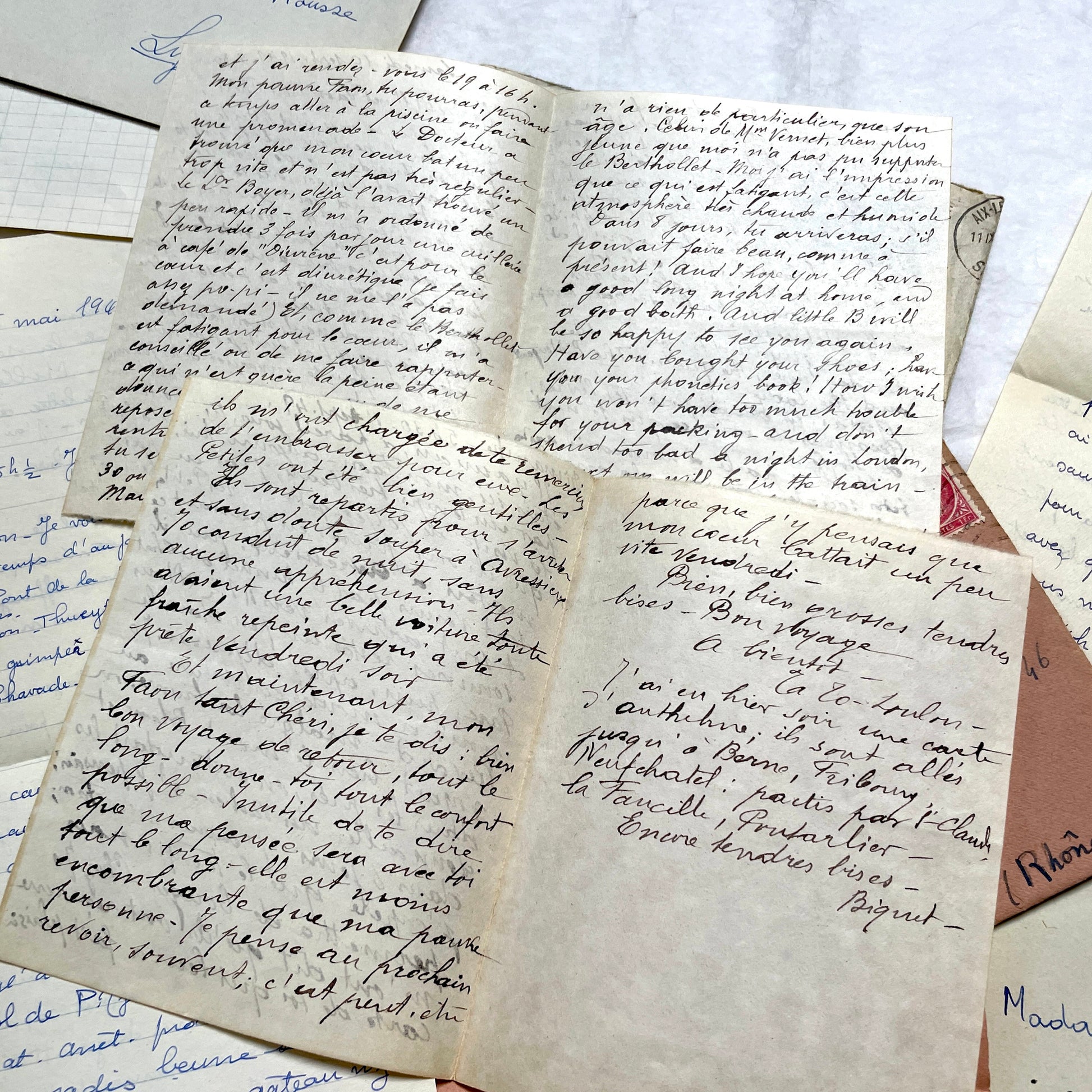 Set of 1940s vintage French letters with envelopes, featuring handwritten text, original stamps, and postmarks.