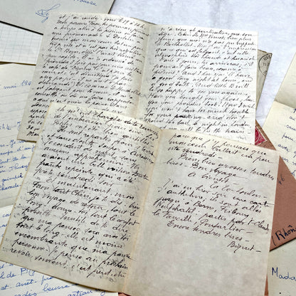 Set of 1940s vintage French letters with envelopes, featuring handwritten text, original stamps, and postmarks.
