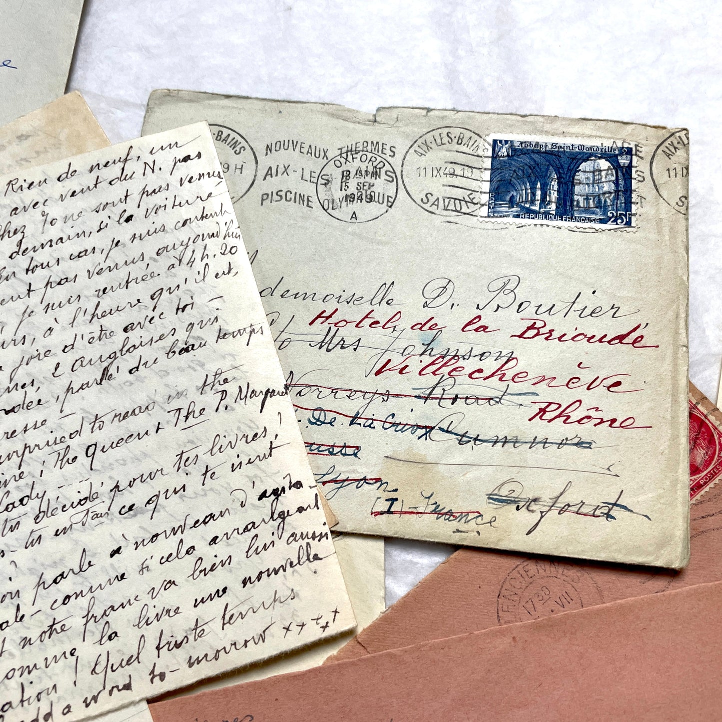 Set of 1940s vintage French letters with envelopes, featuring handwritten text, original stamps, and postmarks.