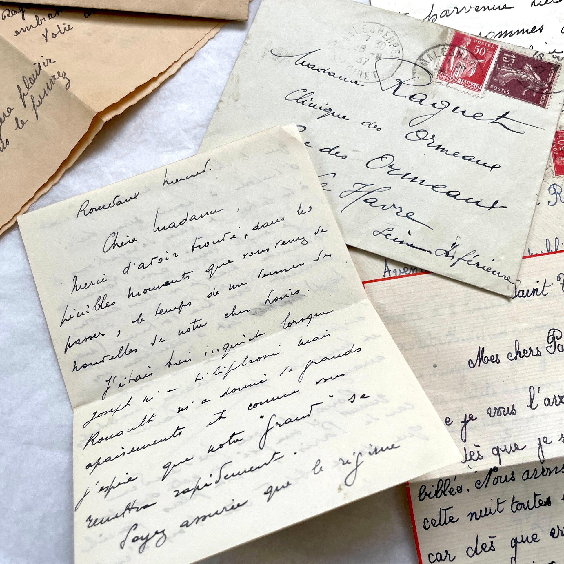 1930s French handwritten letter set with original envelopes and vintage stamps. Historical ephemera collection.