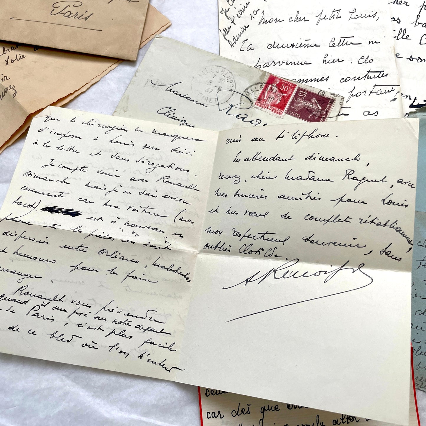 1930s French handwritten letter set with original envelopes and vintage stamps. Historical ephemera collection.