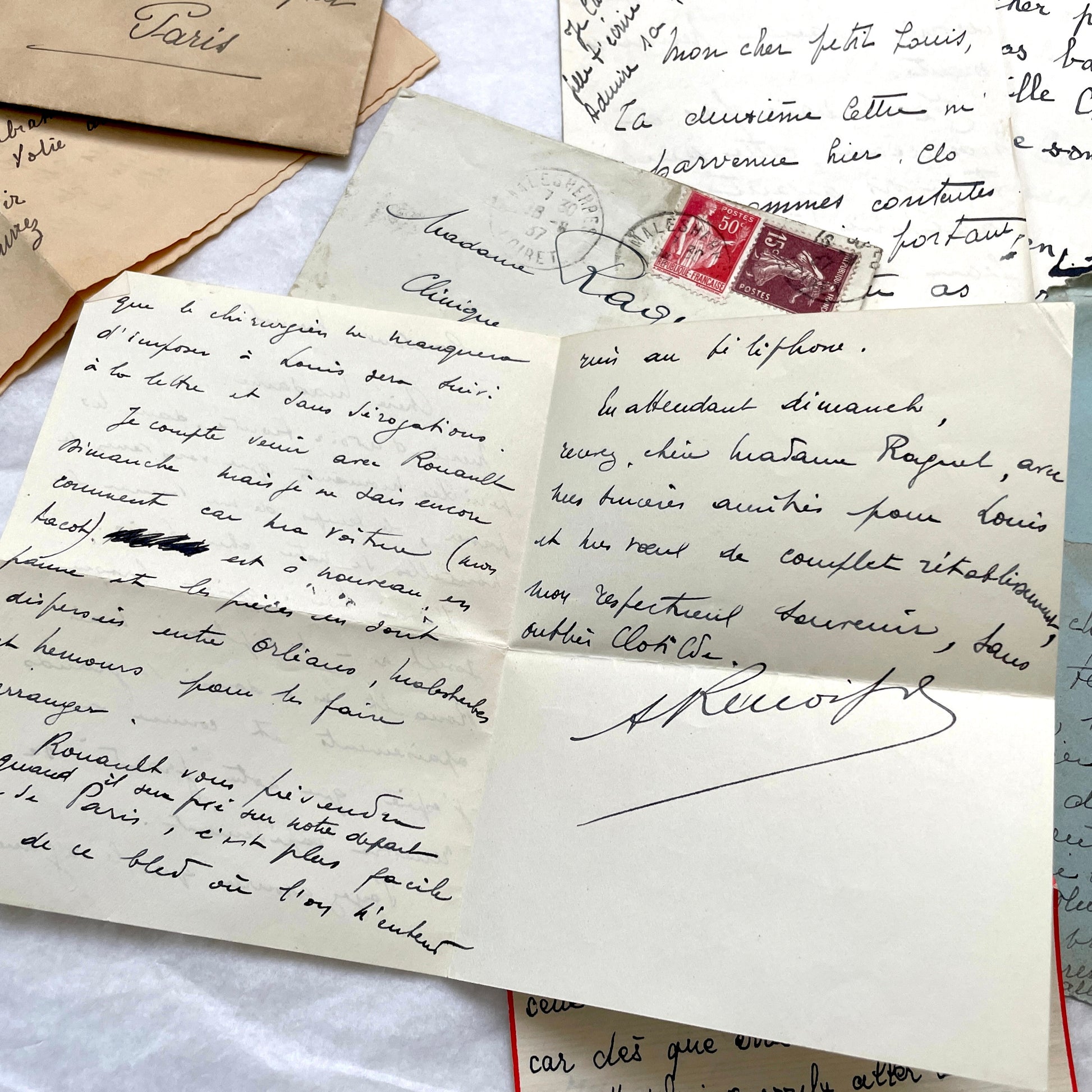 1930s French handwritten letter set with original envelopes and vintage stamps. Historical ephemera collection.