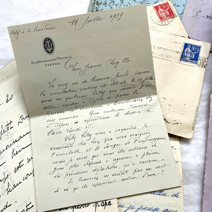 1930s French handwritten letters and envelopes set, featuring vintage stamps and elegant cursive script.