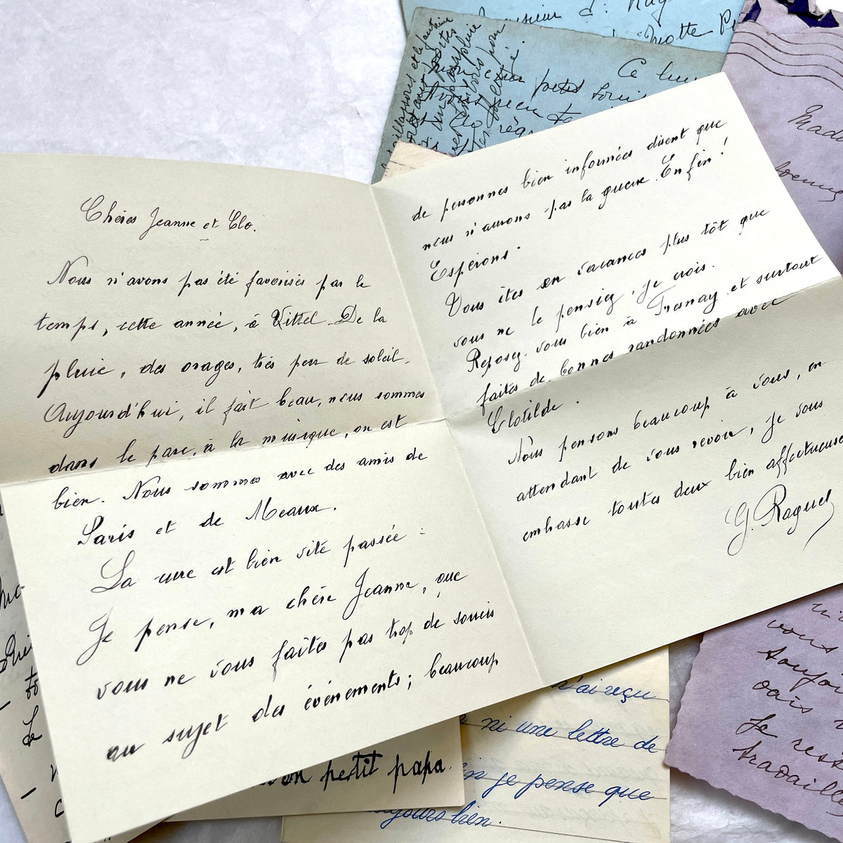1930s French handwritten letters and envelopes set, featuring vintage stamps and elegant cursive script.