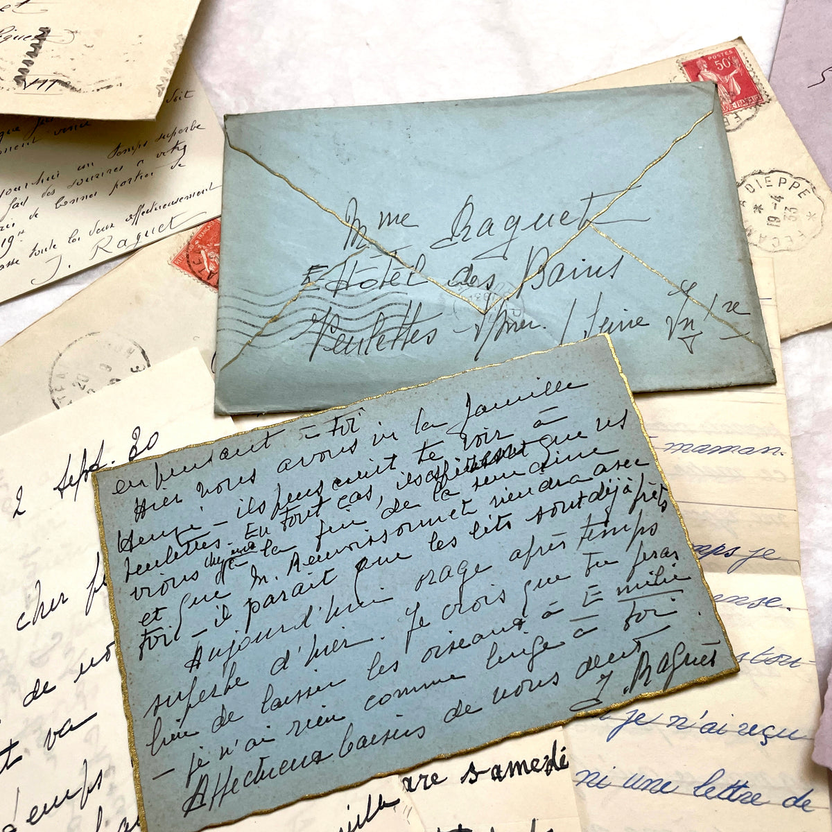 1930s French handwritten letters and envelopes set, featuring vintage stamps and elegant cursive script.
