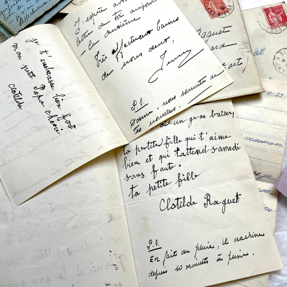 1930s French handwritten letters and envelopes set, featuring vintage stamps and elegant cursive script.