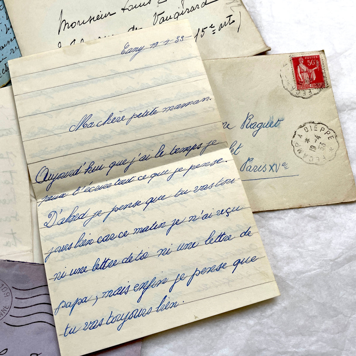 1930s French handwritten letters and envelopes set, featuring vintage stamps and elegant cursive script.