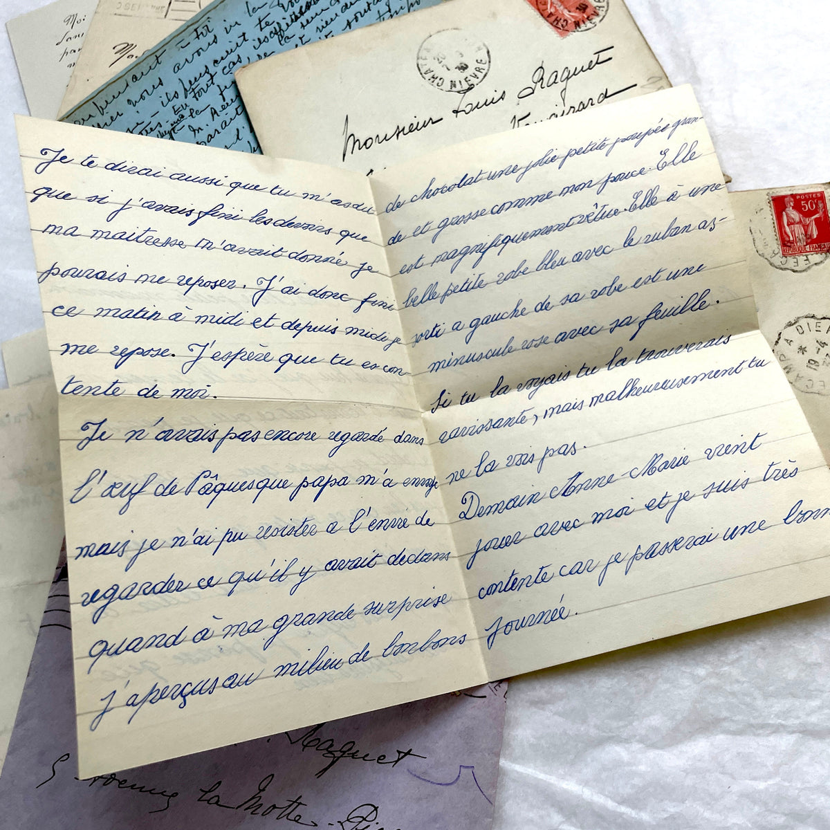 1930s French handwritten letters and envelopes set, featuring vintage stamps and elegant cursive script.