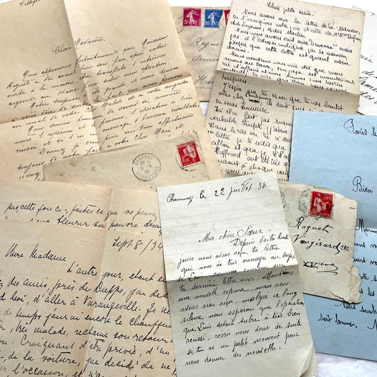 1930s French letter set with envelopes, showing elegant cursive handwriting, vintage stamps, and postmarks.