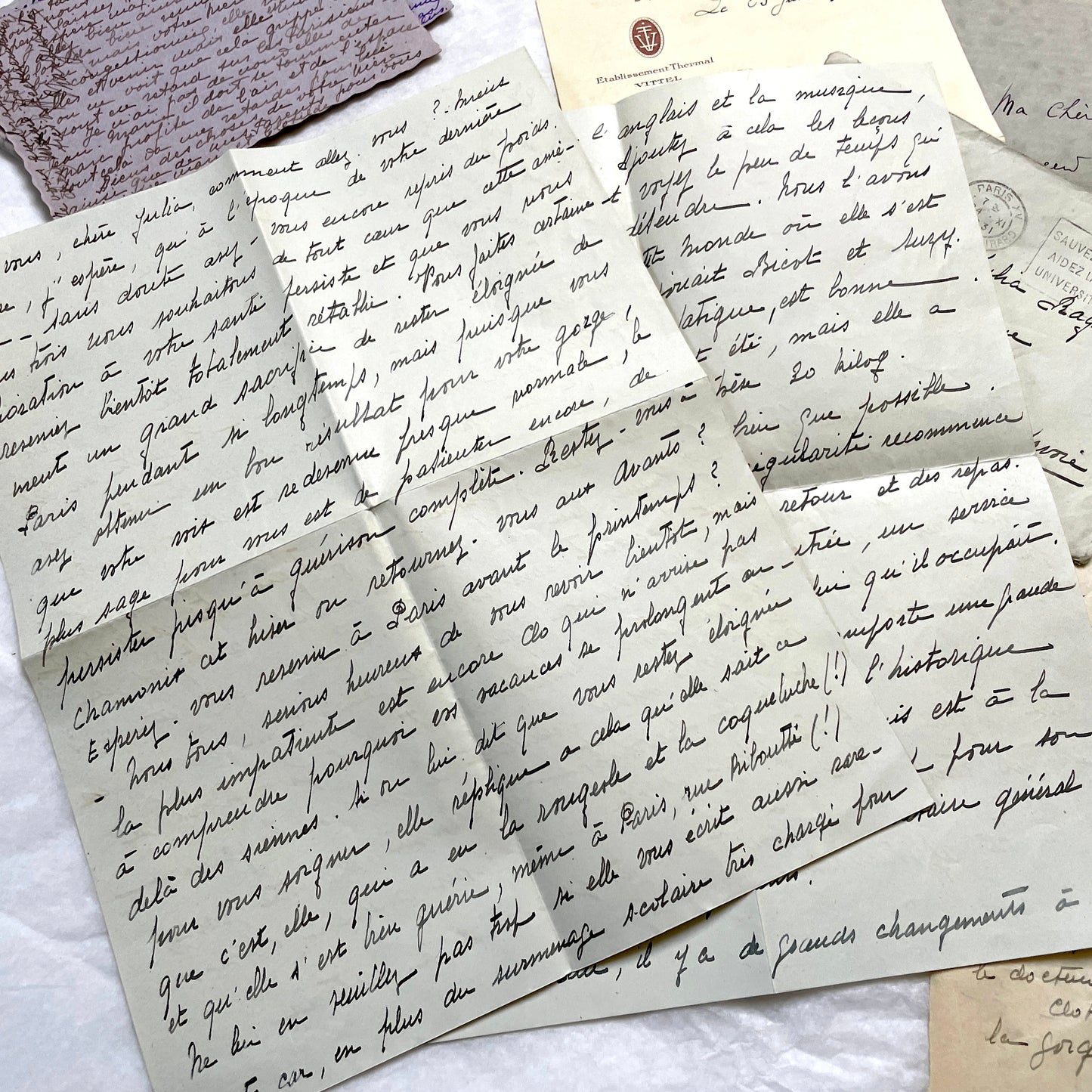 1930s set of 5 French handwritten letters with envelopes, showing elegant script and vintage paper.