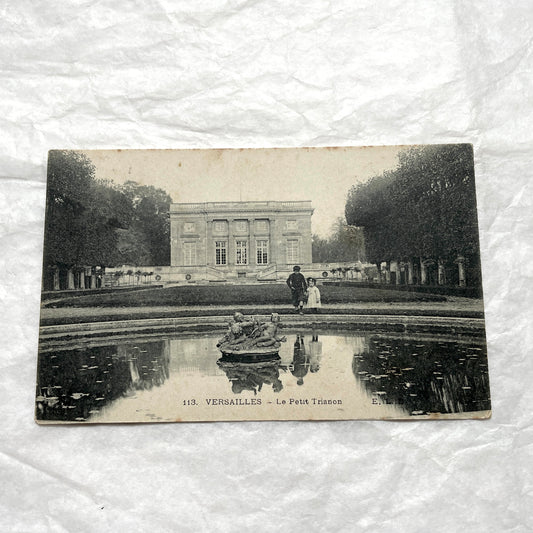 Lot of three 1900s French postcards showing Versailles Grand Trianon, Petit Trianon, and a Paris Montparnasse view.