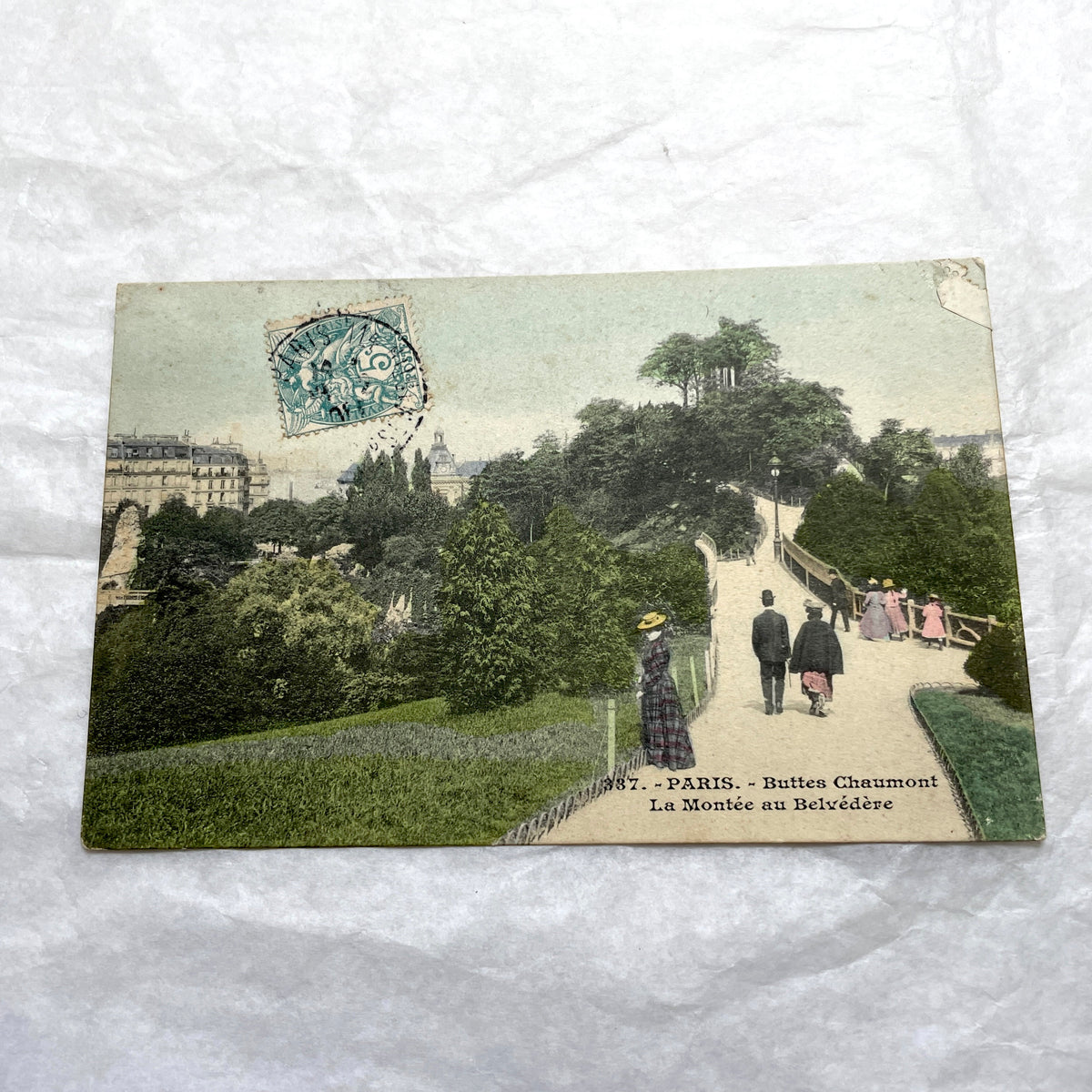 1900s French postcards lot featuring Parisian park scenes from Buttes Chaumont and Parc Montsouris with people.