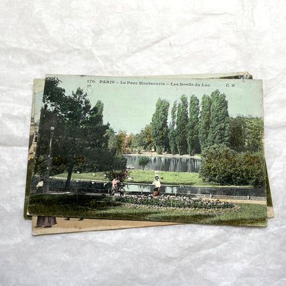 1900s French postcards lot featuring Parisian park scenes from Buttes Chaumont and Parc Montsouris with people.