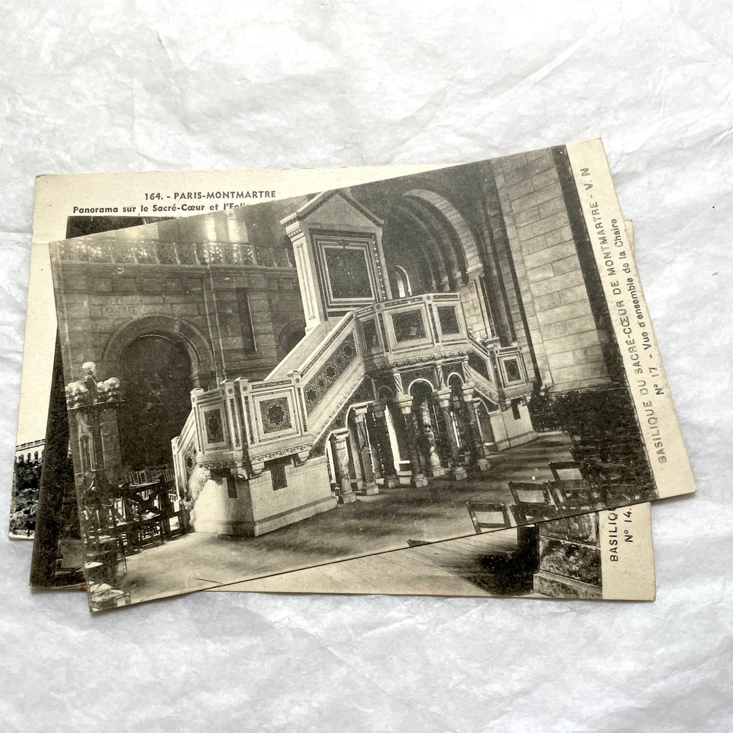 Lot of 1930s postcards showing the Sacré-Cœur Basilica in Montmartre, Paris, including exterior and interior views.
